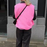 Buttoned sleeveless vest in lambswool for women – Soft, comfortable, and versatile