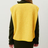Buttoned sleeveless vest in lambswool for women – Soft, comfortable, and versatile