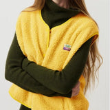 Buttoned sleeveless vest in lambswool for women – Soft, comfortable, and versatile